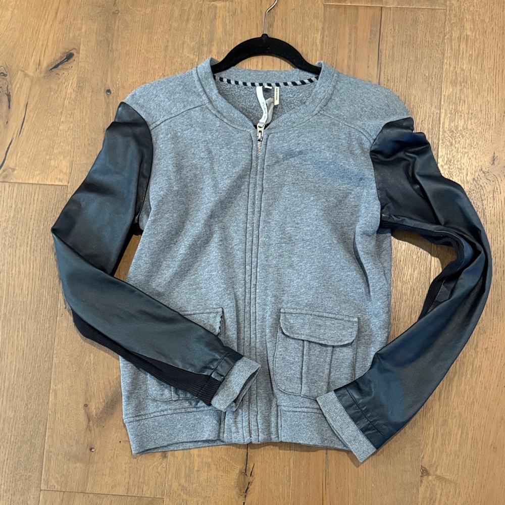 Gray zip up sweatshirt with Black Leather Sleeves